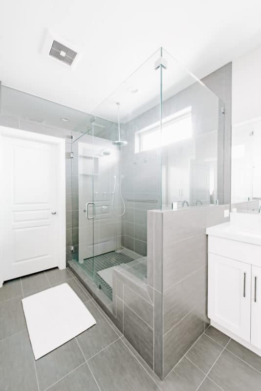 bathroom remodel large glass enclosed shower, white cabinets grey tile