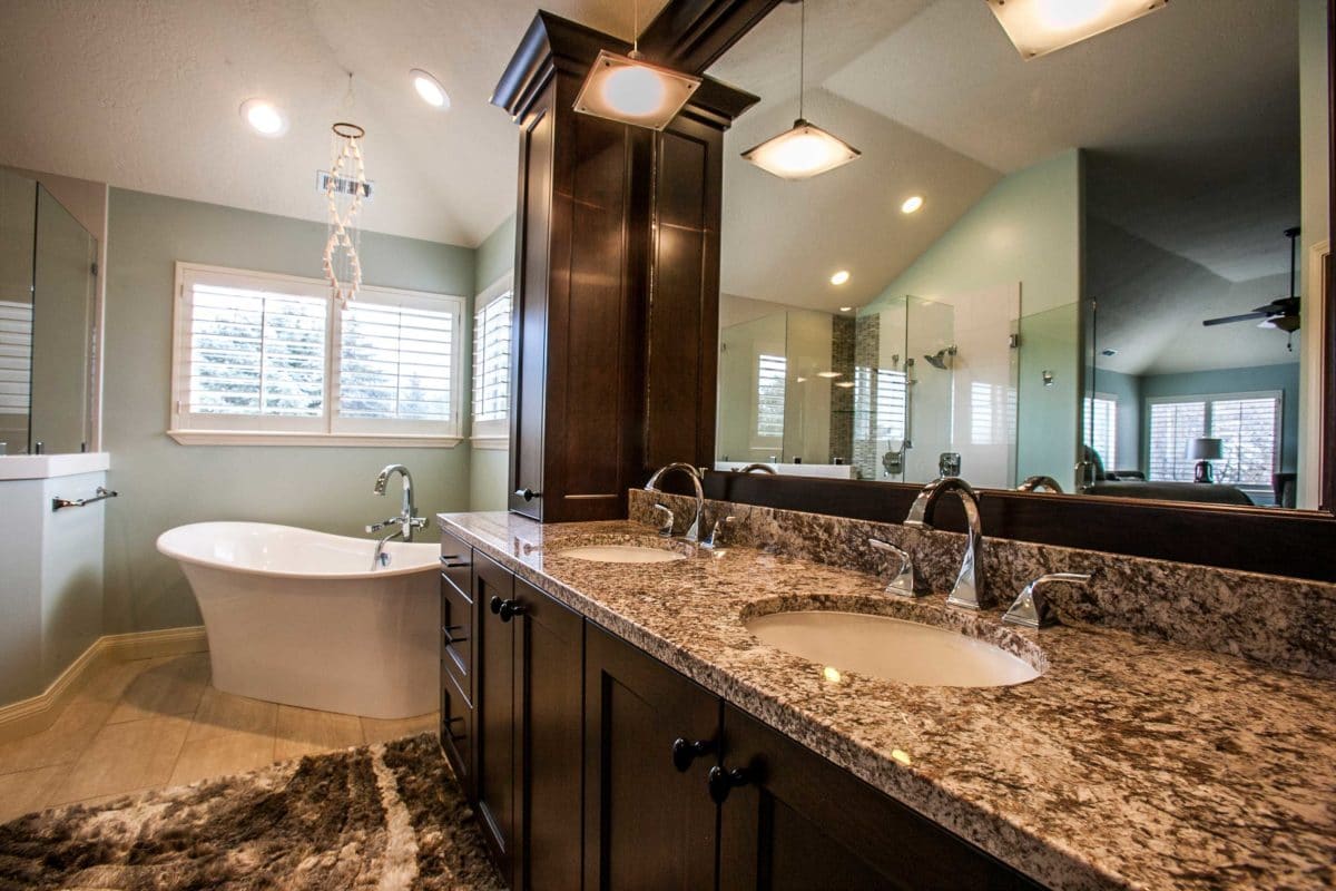 Master Bathroom with large tub on left and the right is the bathroom sink and counter
