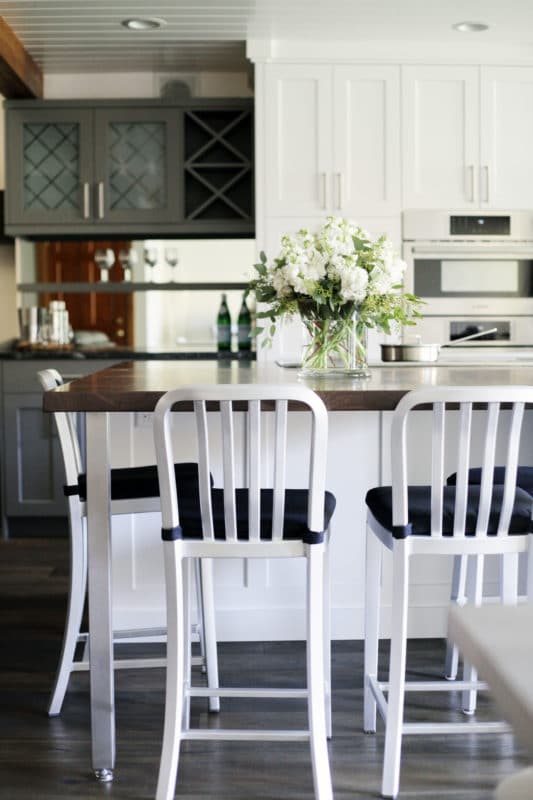 wood kitchen table with white chairs