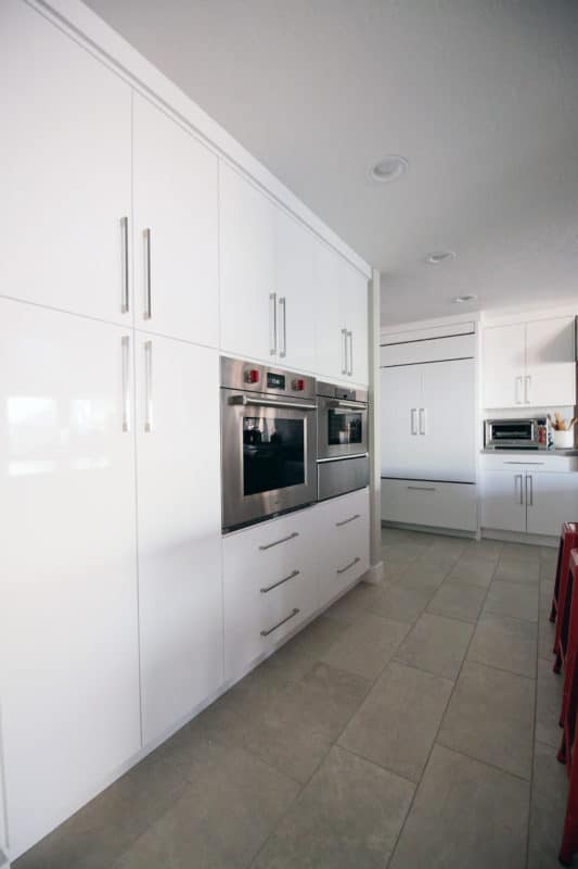 wolf oven in wall white gloss cabinets