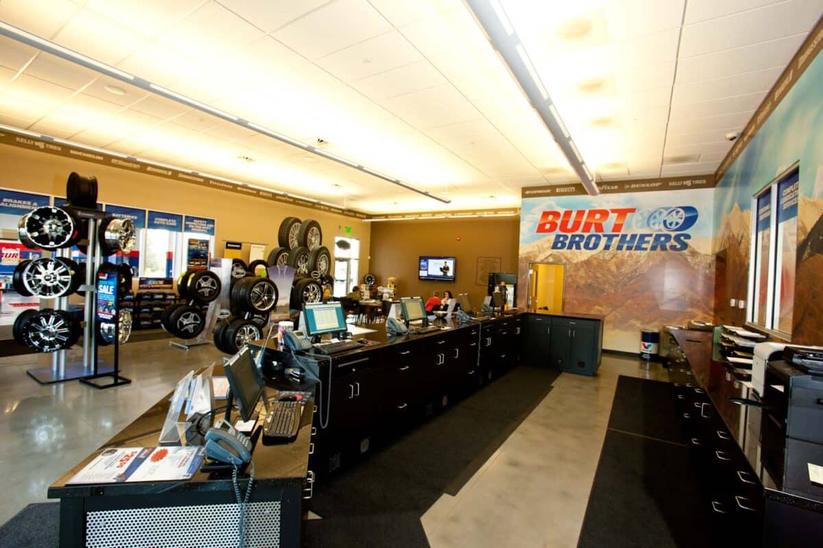 remodeled inside of tire store lobby view from behind the desk area, burt brothers logo on the wall