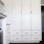 tall cabinets and drawers in a laundry room