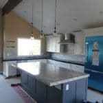 light fixtures being installed in kitchen remodel