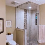 master bathroom with glass enclosed shower