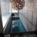 Glass floor over the lap pool. view into the pool through the window